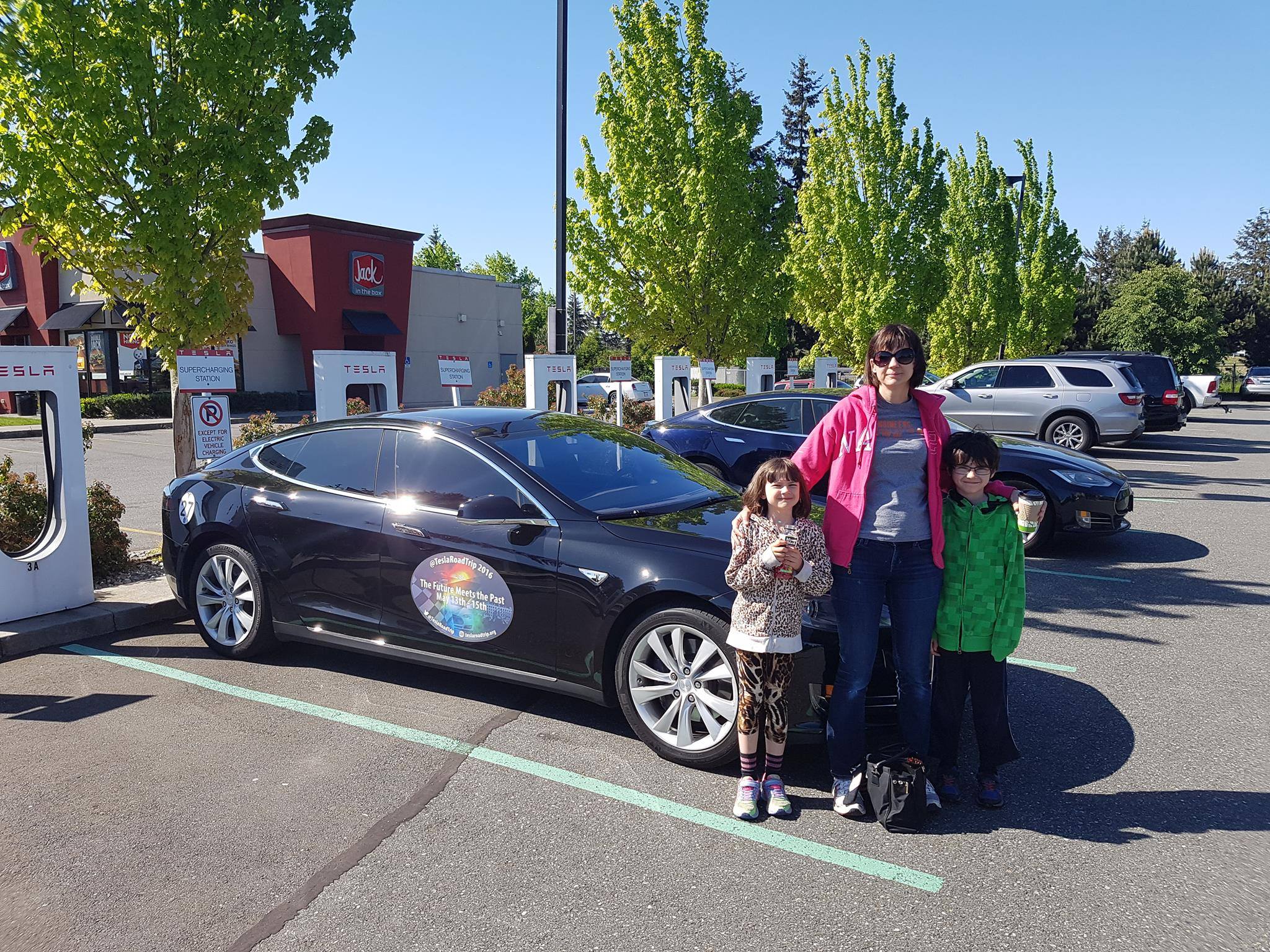 Lisa Locke and family at a SuperCharger